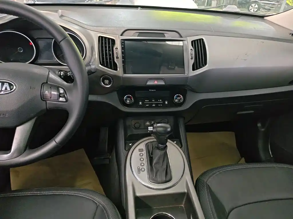 Фото 13 - Kia Sportage